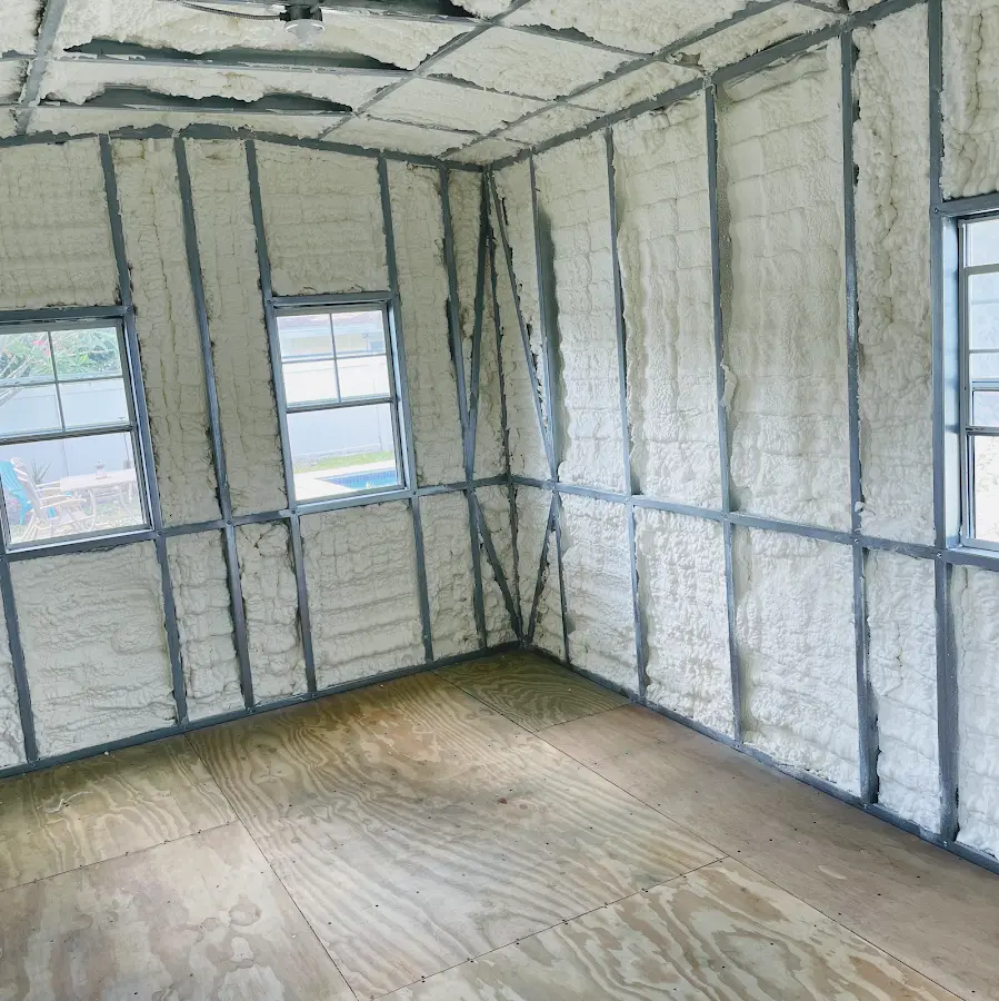 Closed-cell spray foam insulation applied to wall cavities in a residential project in Lake Tapps